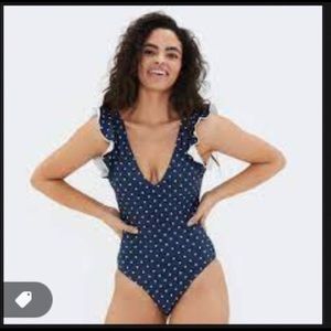 Ruffle Backflip from Summersalt discontinued print! Navy with white polka dots.